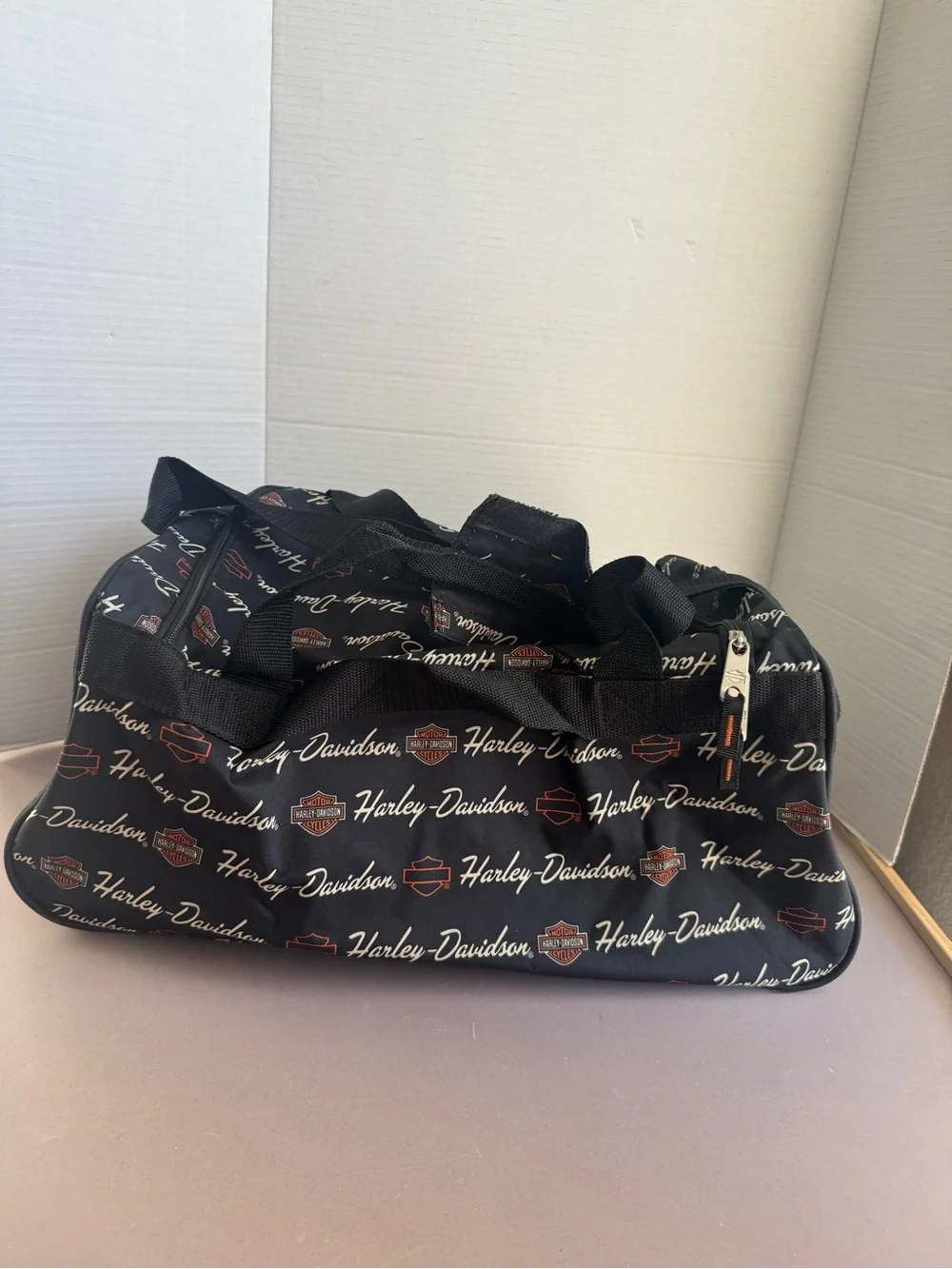 Harley-Davidson Black Duffel with White Script and Orange Accents